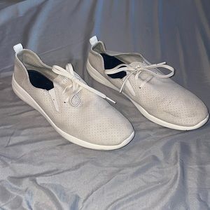 Sperry slip on sneakers.